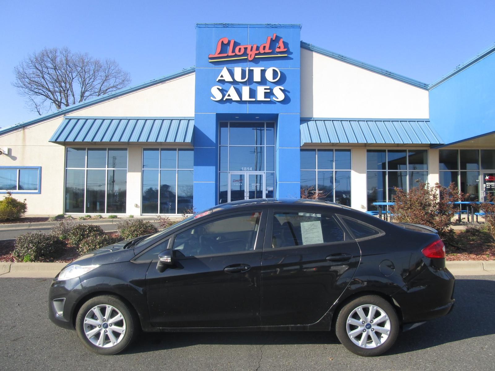 2013 BLACK /Black / Cloth Ford Fiesta SE Sedan (3FADP4BJ5DM) with an 1.6L L4 DOHC 16V engine, located at 1814 Albert Pike Road, Hot Springs, AR, 71913, (501) 623-1717, 34.494228, -93.094070 - Photo #0